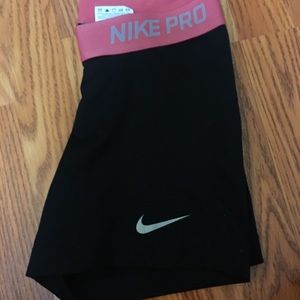 Black with red Nike spandex